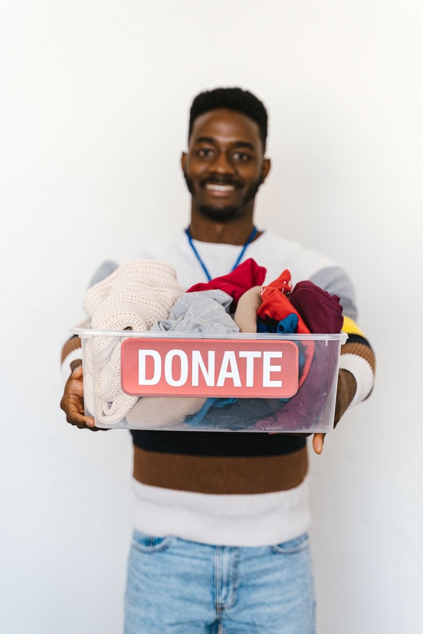 Cardboard boxes labeled for donating and keeping