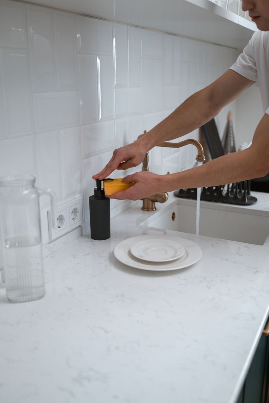 A clean kitchen counter with only a few items on it