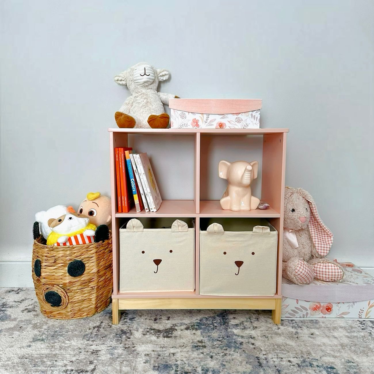 Storage baskets and boxes on a bedroom shelf