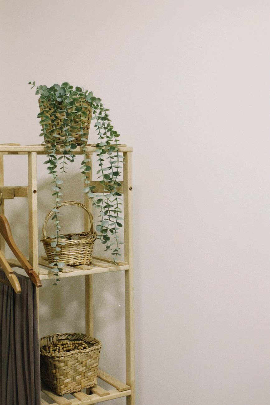 Woven storage baskets on a shelf