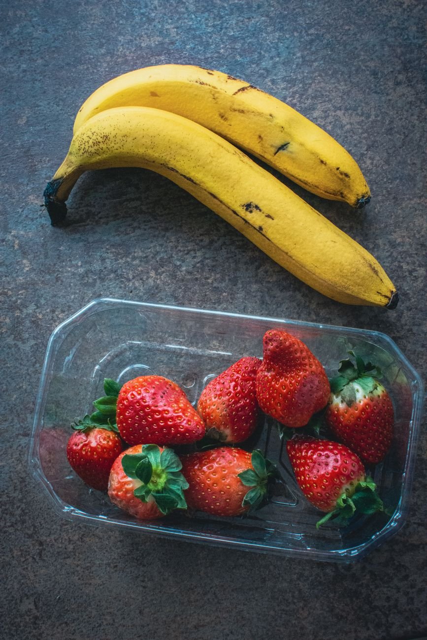 Fresh bananas and strawberries