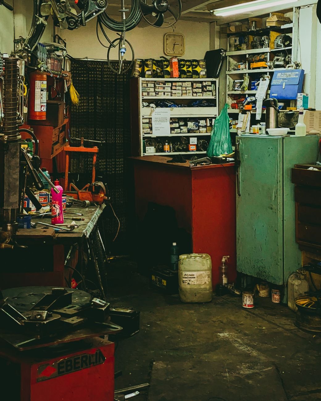 Boxes and clutter piled up in a garage before sorting