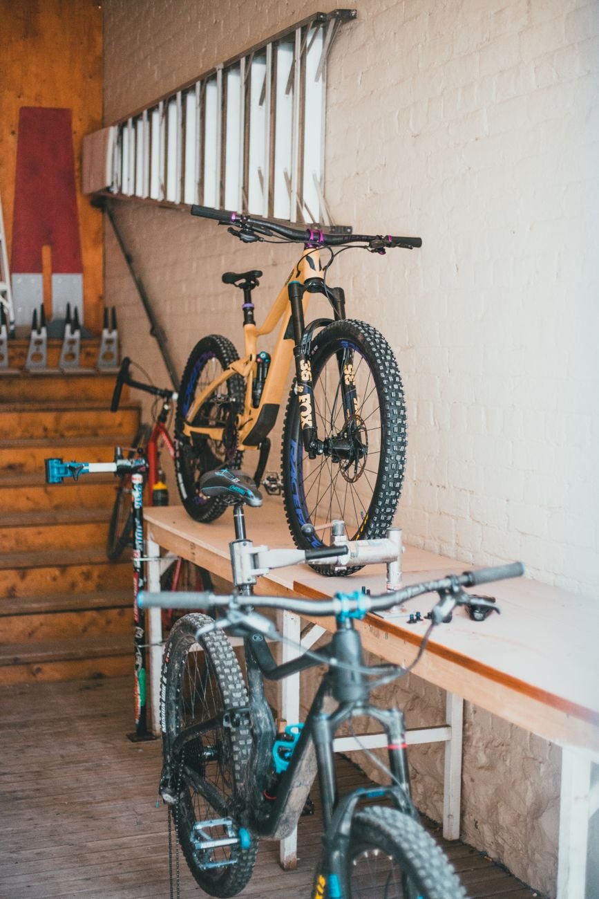 Bikes stored on a wall rack