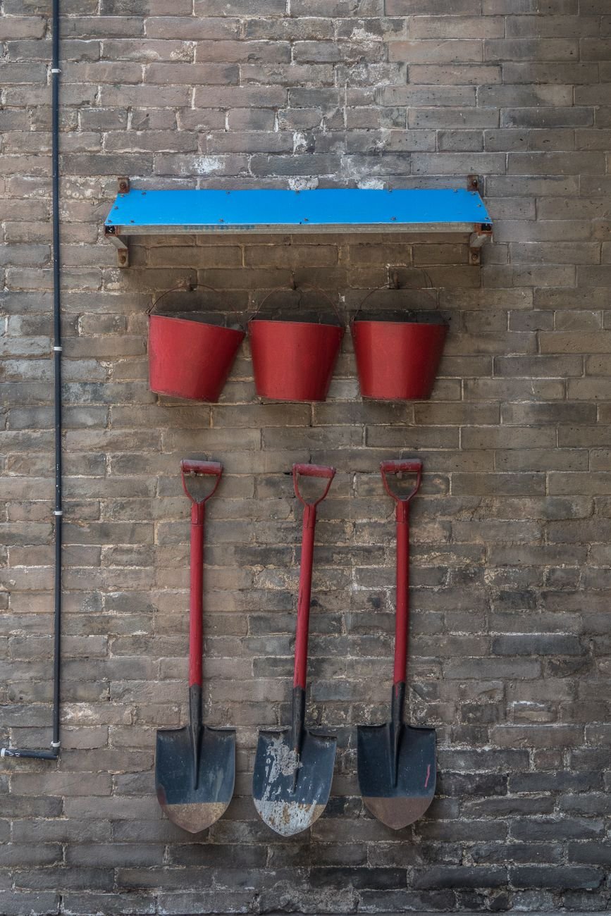 Garden tools hanging on a wall