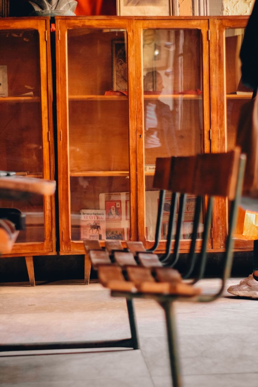 A wooden cabinet that could hide a litter box