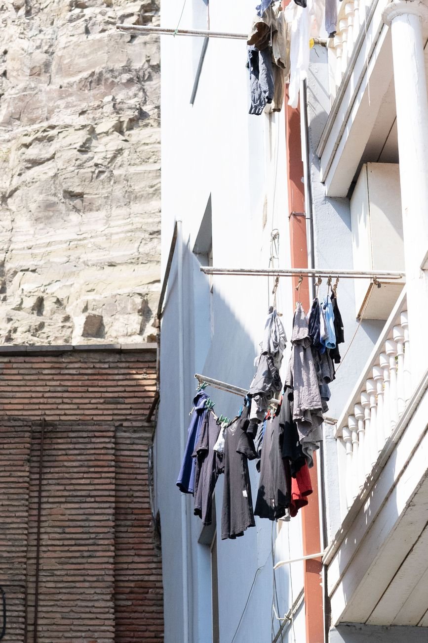 Fresh towels hanging on a clothesline in the sun