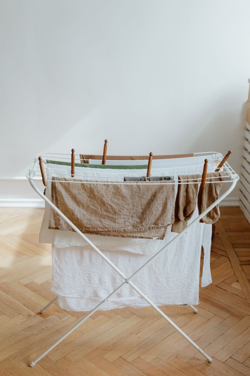 Clothes drying on a rack indoors