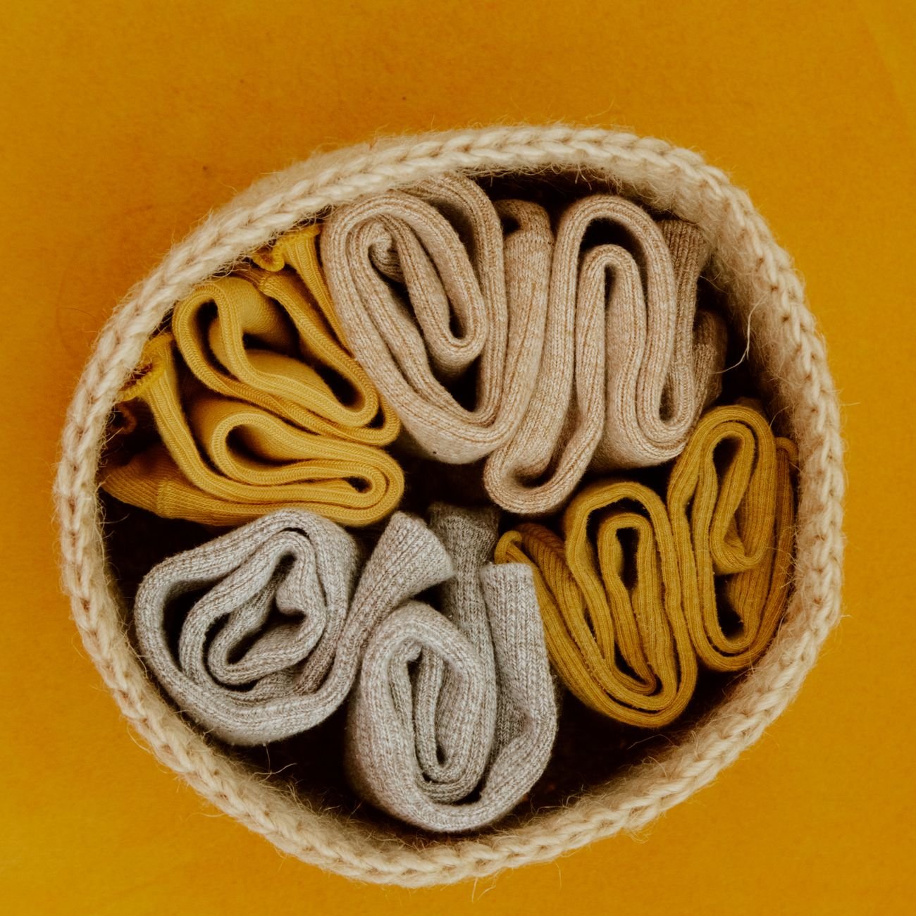 Woven storage baskets on a shelf