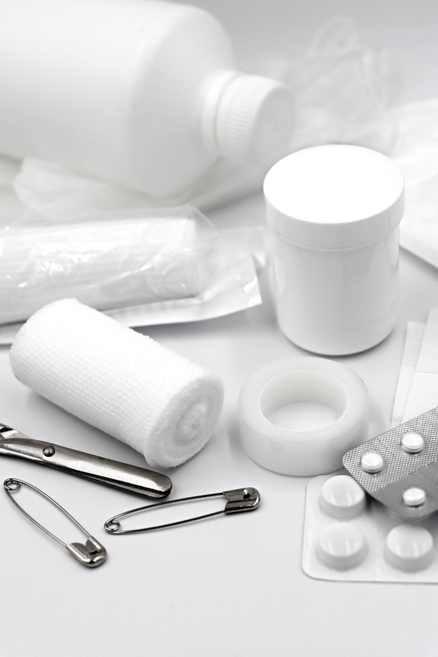 A first aid kit with bandages and supplies