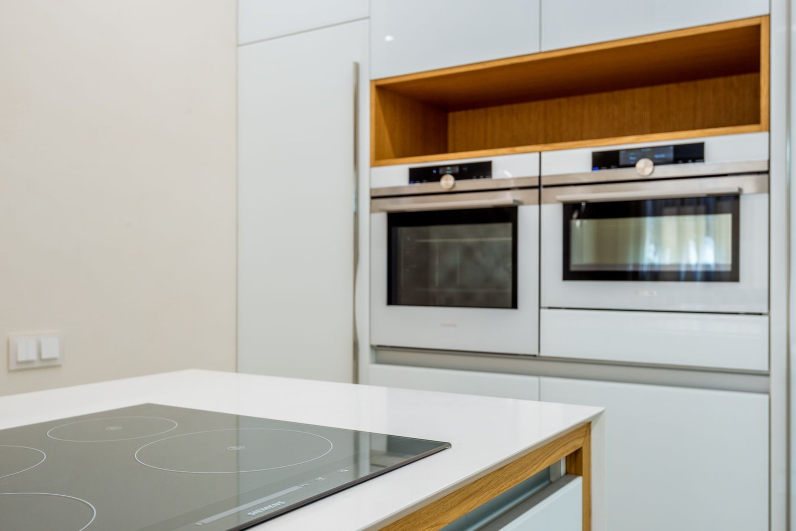 A clean, open oven in a bright kitchen