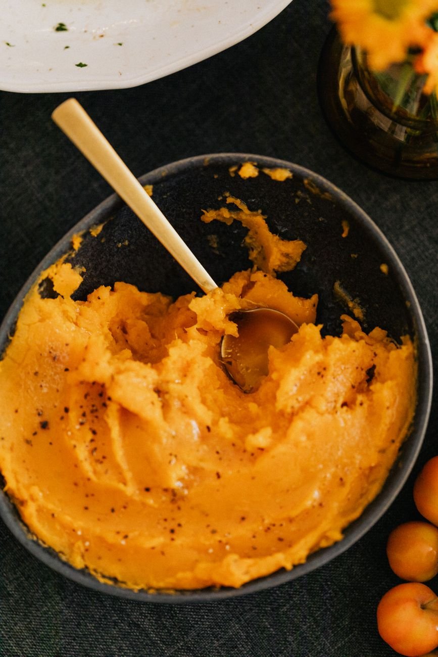A bowl of mashed sweet potato